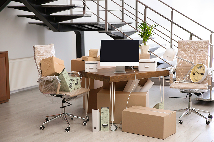 bigstock-Moving-Boxes-And-Furniture-In-292875934